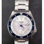 Seiko Sports 5 a stainless-steel gentleman's wristwatch the cream dial with day/date aperture,