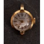 Rolex, an 18ct gold lady's wristwatch the dial with baton numerals and hands and signed Rolex,