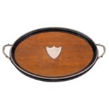 A Victorian silver mounted oval tray marked for Frederick Bausche,