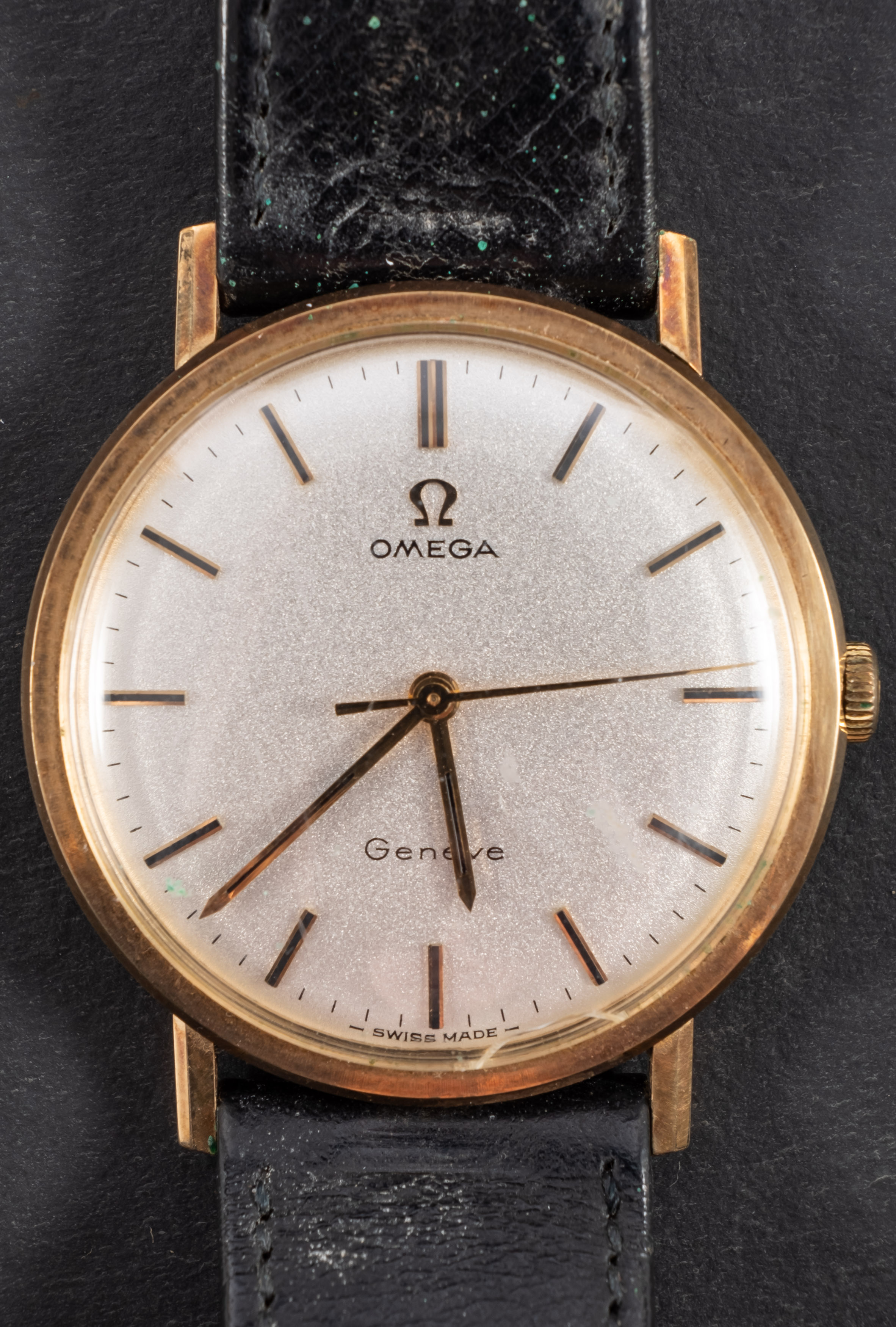 Omega, a gentleman's gold wristwatch, the dial with black and gold baton numerals and hands,