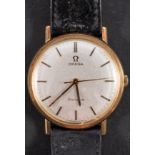 Omega, a gentleman's gold wristwatch, the dial with black and gold baton numerals and hands,