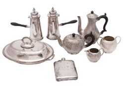 A collection of silver plated items comprising an electroplated four-piece tea and coffee set with