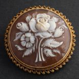 A 1970's 9ct gold, shell cameo brooch/ pendant, depicting a bouquet of flowers,