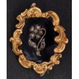 An early Victorian mourning brooch, the front designed as a pansy, set with rose-cut diamonds,