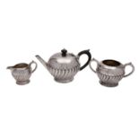 A Victorian silver three-piece tea service, maker Robert Harper, Britannia Standard London 1878,