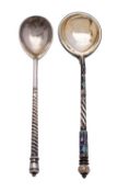 A Russian silver gilt and champleve caviar spoon, early 20th century, possibly Michael Smirnov,