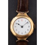 A 18ct gold lady's wristwatch the white enamel dial with Arabic numerals and blued steel spade