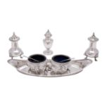 A pair of Victorian silver salts, London 1900, in the Georgian style with blue glass liners,
