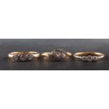 Three diamond three-stone rings, including an 18ct gold ring, total estimated diamond weight ca. 0.