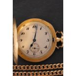 An 18ct gold Edwardian hunter pocket watch with chain the movement having a lever escapement with