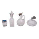 A group of silver and glass bottles, comprising a German silver claret jug, maker ELIMEYER,