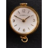 Gubelin, a small round fob watch the dial with raised baton numerals,