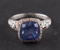 An early 20th century, cushion-cut sapphire, rose and single-cut diamond cluster ring,