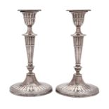 A pair of George V silver candlesticks, William Hutton and Son, Sheffield, 1918,