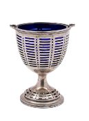 An Edward VII silver swing handled sugar basket, maker Thomas Bradbury & Sons,
