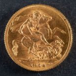 A George V gold sovereign coin, dated 1914, diameter ca. 22mms, total weight ca. 8gms.