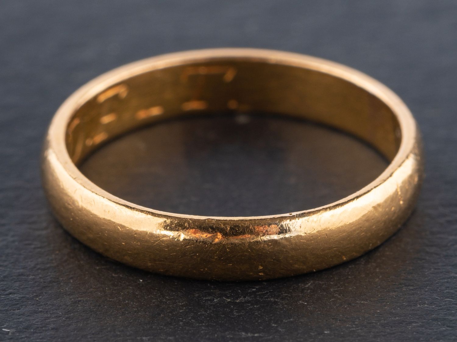 A 22ct gold band ring, ring size N, total weight ca. 4.1gms.