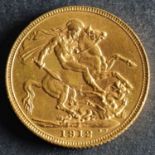 A 1912 Georgian Gold Sovereign.