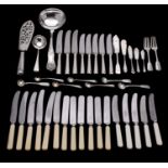 A quantity of silver and silver plated flatware to include: eight table knives with hallmarked