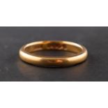 A 22ct. gold band ring, ring size K, total weight ca. 3.3gms.