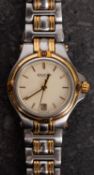 Gucci, a stainless-steel and gold-plated lady's wristwatch,