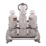 WITHDRAWN A George V silver eight bottle cruet frame, William Eaton, London, 1821,