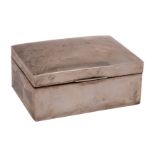 A George V silver rectangular cigarette casket, makers H.V. Pitney & Co.