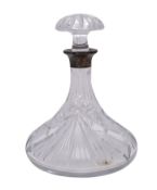 A silver mounted cut glass ship's decanter and mushroom stopper of traditional shape.