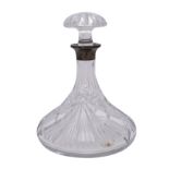 A silver mounted cut glass ship's decanter and mushroom stopper of traditional shape.