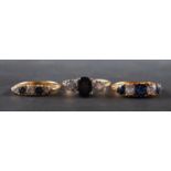 Three sapphire and diamond rings, including a five-stone ring, marked '18',