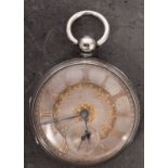 A silver pocket watch the silver dial with applied gold Roman numerals and decoration,