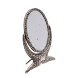 An Edward VII silver oval swing frame easel dressing table mirror,