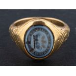 A Victorian, sardonyx mourning ring, engraved with heraldic device,