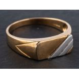 A 9ct, bicolour, gold ring, length of ring head ca. 1.5cm, ring size Y, total weight ca. 3gms.