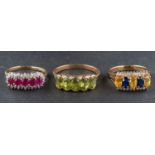 Three 9ct gold, gemset rings, including a peridot five stone ring, ring size T; a sapphire,