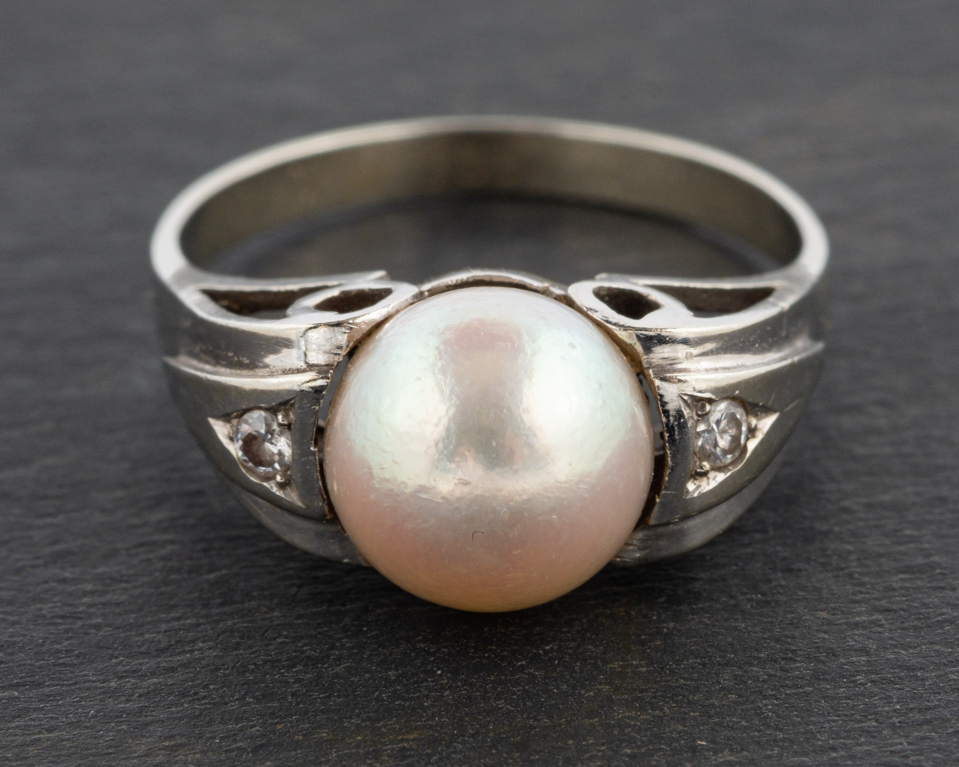 A cultured pearl and single-cut diamond ring, diameter of cultured pearl ca. 8.