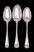 Three Hanoverian tablespoons, two by James Wilks, London 1742 and 1748, the other by Henry Norris,