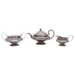A George IV silver three piece tea service, maker William Hunter II,