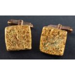 A pair of textured, square cufflinks, length of cufflink head ca. 1.8cm, total weight ca. 36.6gms.