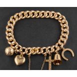 A curb-link charm bracelet, stamped '15', the majority of charms including a bell, a horseshoe,