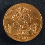 A George V gold sovereign coin, dated 1912, diameter ca. 22mms, total weight ca. 7.9gms.