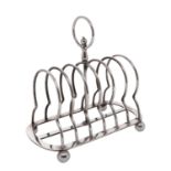 WITHDRAWN An Edward VII silver toast rack, maker Walker and Hall, Sheffield, 1905,