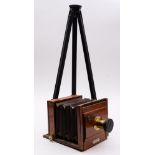 An early 20th-century mahogany and brass half plate camera, maker Stereoscopic Co. Ltd.