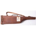 A brown leather leg-o-mutton gun case, to fit 30 inch barrels, 78.5cm long.