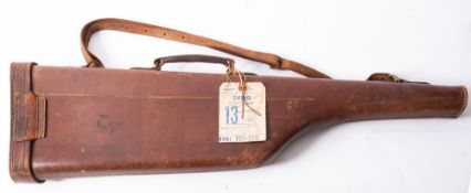 A brown leather leg-o-mutton gun case, to fit 30 inch barrels, 78.5cm long.