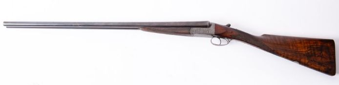 A 16 bore side by side shotgun, maker William Ford,