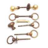 A pair of brass door handles: together with a pair of brass ring door handles,