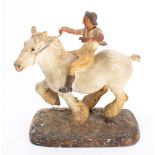 A plaster figure of a man on a Shire horse , modelled after W M Chance,