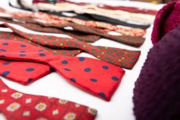 A collection of silk bow ties, including a Christian Dior burgundy silk bow tie,