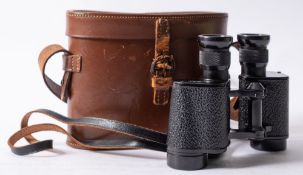 A pair of Crystar 6x30 binoculars, maker Wray of London in fitted leather case.